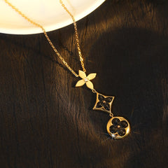 STAR AND SUN ONYX PINK GOLD NECKLACE