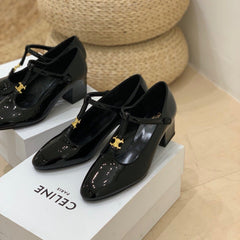 TRIOMPHE T-BAR HIGH PUMPS IN BLACK PATENT CALFSKIN