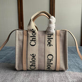 SMALL STRAP WOODY TOTE BAG 26.5 IN BEIGE LINEN CANVAS BLACK WEBBING LOGO EMBROIDER NUDE CALFSKIN