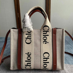 SMALL STRAP WOODY TOTE BAG 26.5 IN BEIGE LINEN CANVAS BLACK WEBBING LOGO EMBROIDER BROWN CALFSKIN