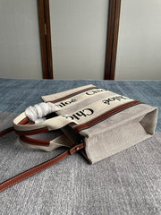 SMALL STRAP WOODY TOTE BAG 26.5 IN BEIGE LINEN CANVAS BLACK WEBBING LOGO EMBROIDER BROWN CALFSKIN