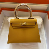 KELLY MINI 20 BAG IN DIJON YELLOW CALFSKIN WITH GOLD HARDWARE