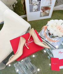 EFFLORESCENCE POINTED-TOE PUMPS IN NUDE SATIN WITH CRYSTAL BUCKLE