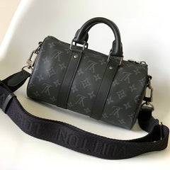 KEEPALL BANDOULIÈRE 25 IN BLACK MONOGRAM HERITAGE CANVAS