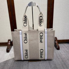 MEDIUM WOODY TOTE BAG 37 IN BEIGE LINEN CANVAS WEBBING BLACK LOGO EMBROIDER WHITE CALFSKIN