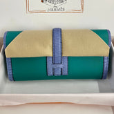 JIGE ELAN 29 CLUTCH IN TEAL GREEN CALFSKIN WITH ROYAL BLUE LIZARD SKIN
