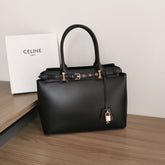 CONTI BAG 36 IN BLACK CALFSKIN GOLD HARDWARE