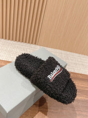 FURRY SLIDES IN BLACK CURLY SHEARLING