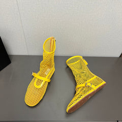 ALAIA SHORT BOOTS IN LEMON YELLOW MESH FISHNET
