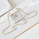 CHANEL 25S MINI VANITY BAG 11 CM IN WHITE LAMBSKIN WITH CRYSTAL-EMBELLISHED CC LOGO