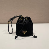 MINI BUCKET BAG 10 IN BLACK RE-NYLON AND SAFFIANO LEATHER STRAP