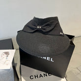MM OPEN-TOP STRAW HAT IN BLACK WITH LARGE BOW