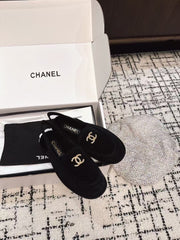 SLINGBACK LOAFER IN BLACK SUEDE AND SHEARLING