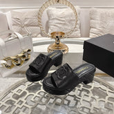 CC EMBOSSED LOGO HIGH HEELS IN BLACK QUILTED CALFSKIN