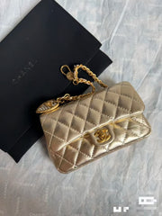 CC CLASSIC FLAP BAG 13 IN GOLD LAMBSKIN WITH PEARL HEART CHARM