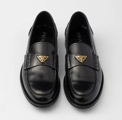 PRADA LOAFER IN BLACK PATENT CALFSKIN