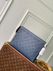 POCHETTE VOYAGE 27 IN DARK BLUE MONOGRAM ECLIPSE CALFSKIN EMBOSSED LOGO