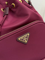PRADA 25S DUET BUCKET BAG 23 IN BURGUNDY RE-NYLON GOLD HARDWRE