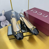 GG HIGH HEELS 65 IN BLACK GLOSSY LEATHER WITH GOLD HARDWARE