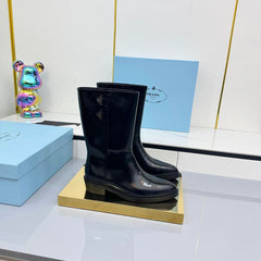PRADA 25S BROOKLYN BOOTS 50MM IN BLACK GLOSSY CALFSKIN WITH LOGO