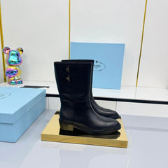 PRADA 25S BROOKLYN BOOTS 50MM IN BLACK CALFSKIN WITH LOGO