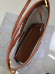 YSL 25S Y SMALL BUCKET 29 IN DESERT DUST AND BRICK CANVAS GOLD HARDWRE