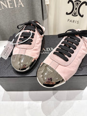 PRADA 25S MULES IN LIGHT PINK WITH METAL TOECAP