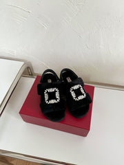 SLIDY VIV' WINTER FUR STRASS BUCKLE SANDALS IN BLACK SHEARLING
