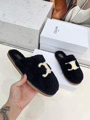 CELINE 25S GEORGIA SLIDE IN SHEARLING IN BLACK
