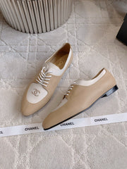 CHANEL 25S TWO TONE LACE UP IN BEIGE CALFSKIN