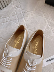 CHANEL 25S TWO TONE LACE UP IN BEIGE CALFSKIN