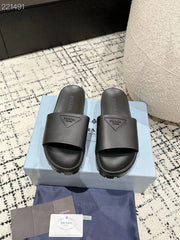 PRADA 25S RUBBER SLIDE IN CHARCOAL CALFSKIN WITH LOGO