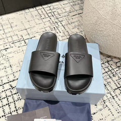 PRADA 25S RUBBER SLIDE IN CHARCOAL CALFSKIN WITH LOGO