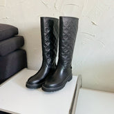 TERRITORY FLAT HIGH BOOT IN BLACK EMBOSSED CALFSKIN