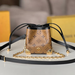 NOE PURSE 11.5 NANO CHARM BROWN MONOGRAM REVERSE CANVAS