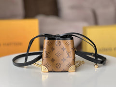 NOE PURSE 11.5 NANO CHARM BROWN MONOGRAM REVERSE CANVAS