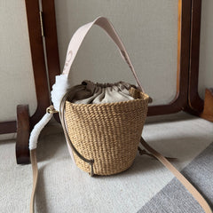 SMALL WOODY BASKET 17 IN NATURAL FIBERS BLUSHY BEIGE WEBBING BROWN CALFSKIN