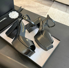 HIGH HEEL PLATFORM SANDALS IN BLACK CALFSKIN