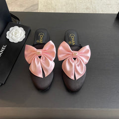 BIG BOW FLAT MULE SANDALS IN BLACK MIX PALE PINK SILK