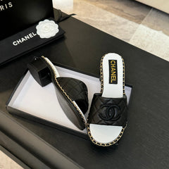 HIGH FLATFORM SLIPPER IN BLACK EMBOSSED SHEEPSKIN