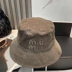 MM BUCKET IN MUTED BROWN VELVET WITH LOGO