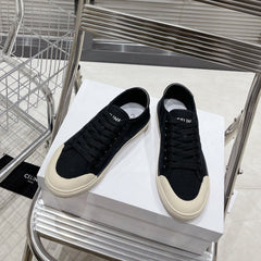 JANE SNEAKERS LOW LACE-UP WITH TRIOMPHE PATCH IN CANVAS AND CALFSKIN BLACK