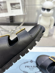 PRADA 25S STRAP SLIDES 30MM IN BLACK CALFSKIN GOLD HARDWARE