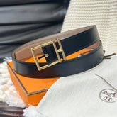 HM NATHAN 32MM REVERSIBLE BELT IN BLACK AND TAN LEATHER GOLD BUCKLE