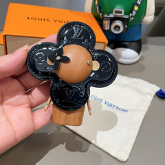 LV KEYCHAIN IN BLACK CALFSKIN AND WOOD