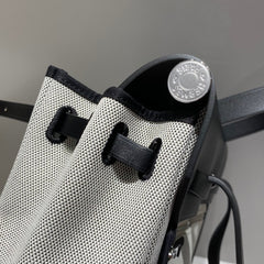 HERBAG A DOS ZIP RETOURNE BACKPACK 29 IN OFF-WHITE CANVAS AND BLACK CALFSKIN