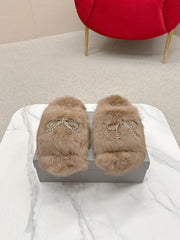 BALENCIAGA 25S SOFT FUR SLIPPERS IN LIGHT BROWN FUR WITH RHINESTONE BOW