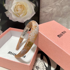 HEADBAND WITH GARNITURE PRINT IN TIGER EYE ORANGE SILK 432822