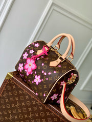 SPEEDY BANDOULIÈRE CHERRY BLOSSOM 25 IN SAKURA BROWN MONOGRAM COATED CANVAS