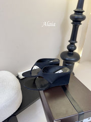 ALAIA WEDGE THONG SANDALS 25S IN BLACK SATIN